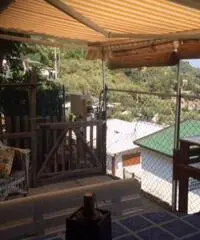 bungalow con annessa roulotte stanziale alassio fronte mare