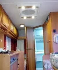 Camper mansardato